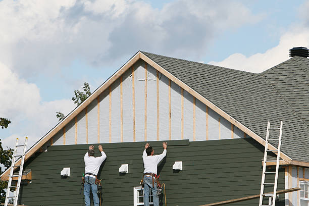 Professional Vinyl Siding technician working in Hollsopple, PA